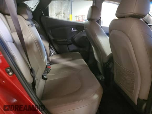 2014 Hyundai Tucson SE z VIN KM8JUCAG4EU798570, wystawiony jako Copart lot #71097605 z przebiegiem 98 818 mil mil oraz Szkoda całkowita • Salvage title. Historia ofert i sprzedaży dostępna na DreamBid. Obrazek 11.