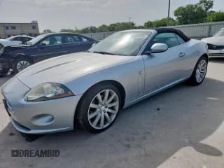 ✅ 2007 Jaguar XK • VIN: SAJDA44B475B05918 • Lot: 63327375. Listed on Copart with 121,599 mi. Free auction sales archive from the USA and detailed vehicle history report at DreamBid. Image 1.