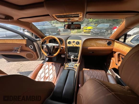 ✅ 2014 Bentley Flying Spur • VIN: SCBEC9ZA0EC090997 • Lot: 66647375. Listed on Copart with 46,000 mi. Free auction sales archive from the USA and detailed vehicle history report at DreamBid. Image 9.