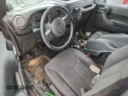 ✅ 2014 Jeep Wrangler Unlimited Sport • VIN: 1C4BJWDG6EL245178 • Лот: 95471365. Опубликован ранее на Copart с пробегом 150 766 миль. Бесплатный доступ к архиву аукционных продаж из США и подробный отчёт об истории автомобиля на DreamBid. Изображение 8.