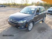 ✅ 2013 Volkswagen Tiguan S • VIN: WVGAV3AXXDW623871 • Lot: 43762873. Listed on IAAI with 145,094 mi. Free auction sales archive from the USA and detailed vehicle history report at DreamBid. Image 2.