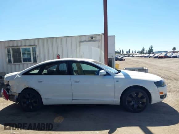 ✅ 2005 Audi A6 • VIN: WAUDG74F25N089470 • Лот: 42899871. Опубликован ранее на IAAI с пробегом 198 726 миль. Бесплатный доступ к архиву аукционных продаж из США и подробный отчёт об истории автомобиля на DreamBid. Изображение 13.