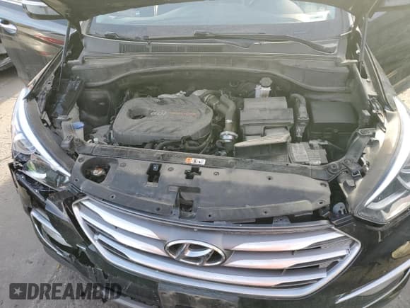 ✅ 2018 Hyundai Santa Fe 2.0T • VIN: 5NMZUDLA6JH106106 • Лот: 71894072. Опубликован ранее на Copart с пробегом 54 296 миль. Бесплатный доступ к архиву аукционных продаж из США и подробный отчёт об истории автомобиля на DreamBid. Изображение 13.