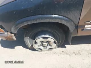 ✅ 2004 Chevrolet Blazer LS • VIN: 1GNDT13X14K156833 • Lot: 42112273. Wystawiony na IAAI z przebiegiem 139 131 mil. Bezpłatny archiwum sprzedaży aukcyjnych z USA i szczegółowy raport historii pojazdu na DreamBid. Zdjęcie 6.