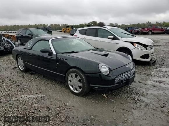 ✅ 2002 Ford Thunderbird Hardtop Premium • VIN: 1FAHP60A52Y119814 • Lot: 82621765. Wystawiony na Copart z przebiegiem Nie podano. Bezpłatny archiwum sprzedaży aukcyjnych z USA i szczegółowy raport historii pojazdu na DreamBid. Zdjęcie 13.
