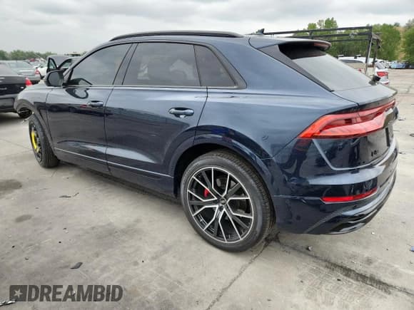 ✅ 2023 Audi Q8 Prestige • VIN: WA1FVBF10PD051745 • Лот: 71208045. Опубликован ранее на Copart с пробегом 14 199 миль. Бесплатный доступ к архиву аукционных продаж из США и подробный отчёт об истории автомобиля на DreamBid. Изображение 2.