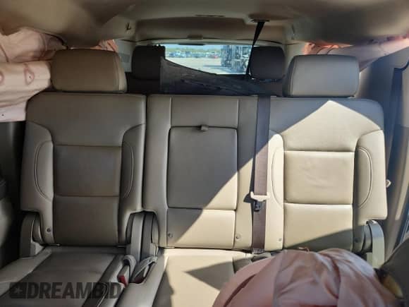 2019 Chevrolet Suburban LT z VIN 1GNSCHKCXKR161435, wystawiony jako Copart lot #90894635 z przebiegiem 189 459 mil mil oraz Czysty tytuł • Clean title. Historia ofert i sprzedaży dostępna na DreamBid. Obrazek 10.