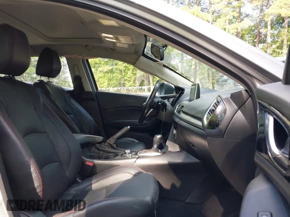 ✅ 2014 Mazda 3 S Grand Touring • VIN: JM1BM1M31E1104005 • Lot: 42808138. Listed on IAAI with 74,071 mi. Free auction sales archive from the USA and detailed vehicle history report at DreamBid. Image 5.
