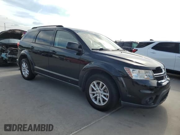 ✅ 2016 Dodge Journey SXT • VIN: 3C4PDCBG1GT153398 • Lot: 87034055. Listed on Copart with 142,414 mi. Free auction sales archive from the USA and detailed vehicle history report at DreamBid. Image 4.