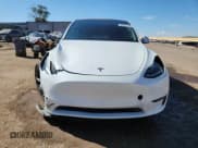 ✅ 2021 Tesla Model Y Long Range • VIN: 5YJYGDEE7MF060729 • Lot: 80831605. Listed on Copart with 65,923 mi. Free auction sales archive from the USA and detailed vehicle history report at DreamBid. Image 5.