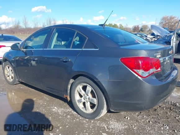 2013 Chevrolet Cruze 1LT с VIN 1G1PC5SB6D7184397, выставлен на аукционе IAAI как лот 43601539 с пробегом 164 464 миль миль и . История ставок и продаж доступна на DreamBid. Изображение 3.