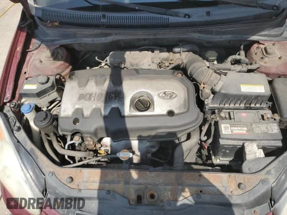 2006 Hyundai Accent GL z VIN KMHCN45C26U052459, wystawiony jako Copart lot #60089355 z przebiegiem 247 311 mil mil oraz Szkoda całkowita • Salvage title. Historia ofert i sprzedaży dostępna na DreamBid. Obrazek 11.