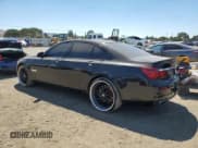 ✅ 2013 BMW 7 Series 750i • VIN: WBAYA8C59DD227527 • Lot: 64618025. Listed on Copart with 96,049 mi. Free auction sales archive from the USA and detailed vehicle history report at DreamBid. Image 2.