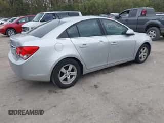 2013 Chevrolet Cruze 1LT z VIN 1G1PC5SB4D7324639, wystawiony jako IAAI lot #43594420 z przebiegiem 143 044 mil mil oraz . Historia ofert i sprzedaży dostępna na DreamBid. Obrazek 4.