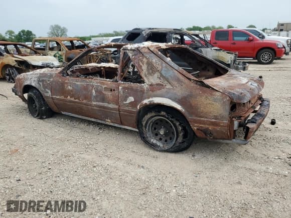 ✅ 1983 Ford Mustang • VIN: 1FABP28FXDF205939 • Лот: 52100115. Опубликован ранее на Copart с пробегом Не указан. Бесплатный доступ к архиву аукционных продаж из США и подробный отчёт об истории автомобиля на DreamBid. Изображение 2.