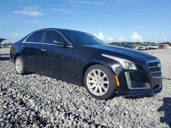 ✅ 2014 Cadillac CTS AWD • VIN: 1G6AW5SX9E0124854 • Lot: 66250785. Listed on Copart with 116,331 mi. Free auction sales archive from the USA and detailed vehicle history report at DreamBid. Image 4.