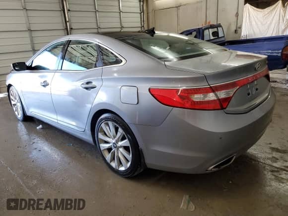 2014 Hyundai Azera Limited с VIN KMHFH4JG7EA411172, выставлен на аукционе Copart как лот 42776985 с пробегом 144 038 миль миль и Списание • Salvage title. История ставок и продаж доступна на DreamBid. Изображение 2.