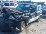 ✅ 1999 Suzuki Grand Vitara JLX • VIN: JS3TD62V2X4120349 • Lot: 42819058. Wystawiony na IAAI z przebiegiem 320 149 mil. Bezpłatny archiwum sprzedaży aukcyjnych z USA i szczegółowy raport historii pojazdu na DreamBid. Zdjęcie 2.