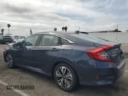 ✅ 2018 Honda Civic EX-T • VIN: 2HGFC1E38JH646217 • Lot: 56607835. Listed on Copart with 56,036 mi. Free auction sales archive from the USA and detailed vehicle history report at DreamBid. Image 2.