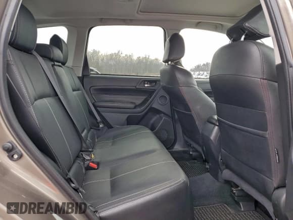 ✅ 2018 Subaru Forester Touring • VIN: JF2SJAWC5JH438871 • Lot: 94630585. Listed on Copart with 129,477 mi. Free auction sales archive from the USA and detailed vehicle history report at DreamBid. Image 11.