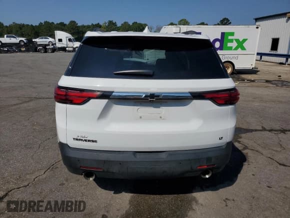 ✅ 2022 Chevrolet Traverse LT Cloth • VIN: 1GNERGKW3NJ164373 • Lot: 84411065. Listed on Copart with 98,499 mi. Free auction sales archive from the USA and detailed vehicle history report at DreamBid. Image 6.