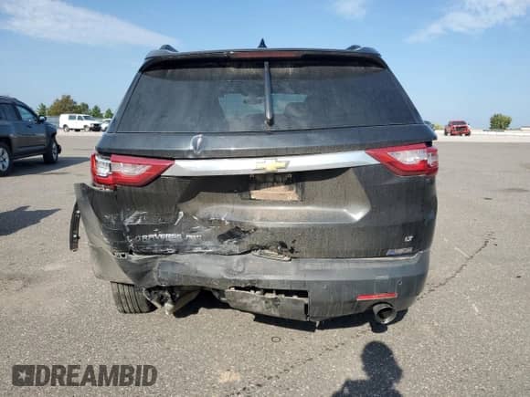 2019 Chevrolet Traverse LT Cloth z VIN 1GNEVGKW6KJ207594, wystawiony jako Copart lot #81287995 z przebiegiem 107 132 mil mil oraz Szkoda całkowita • Salvage title. Historia ofert i sprzedaży dostępna na DreamBid. Obrazek 6.
