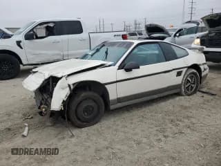 ✅ 1986 Pontiac Fiero • VIN: 1G2PG9796GP283609 • Lot: 79048574. Wystawiony na Copart z przebiegiem 211 447 mil. Bezpłatny archiwum sprzedaży aukcyjnych z USA i szczegółowy raport historii pojazdu na DreamBid. Zdjęcie 1.