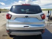 ✅ 2019 Ford Escape Titanium • VIN: 1FMCU9J90KUB85595 • Lot: 57410045. Listed on Copart with 47,995 mi. Free auction sales archive from the USA and detailed vehicle history report at DreamBid. Image 6.