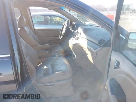 ✅ 2005 Honda Odyssey EX-L • VIN: 5FNRL38795B135505 • Lot: 43860923. Listed on IAAI with 223,573 mi. Free auction sales archive from the USA and detailed vehicle history report at DreamBid. Image 5.