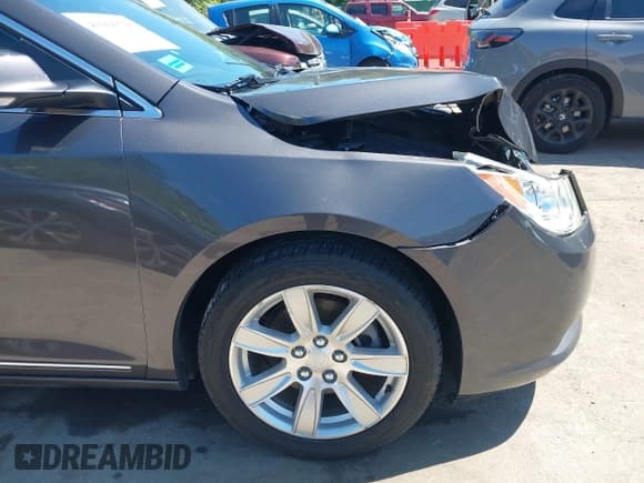 ✅ 2013 Buick LaCrosse Leather • VIN: 1G4GC5E30DF120367 • Лот: 43093786. Опубликован ранее на IAAI с пробегом 132 953 миль. Бесплатный доступ к архиву аукционных продаж из США и подробный отчёт об истории автомобиля на DreamBid. Изображение 17.