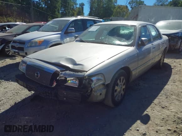 ✅ 2005 Mercury Grand Marquis LS Premium • VIN: 2MEFM75W25X671441 • Lot: 43435697. Listed on IAAI with 136,395 mi. Free auction sales archive from the USA and detailed vehicle history report at DreamBid. Image 2.