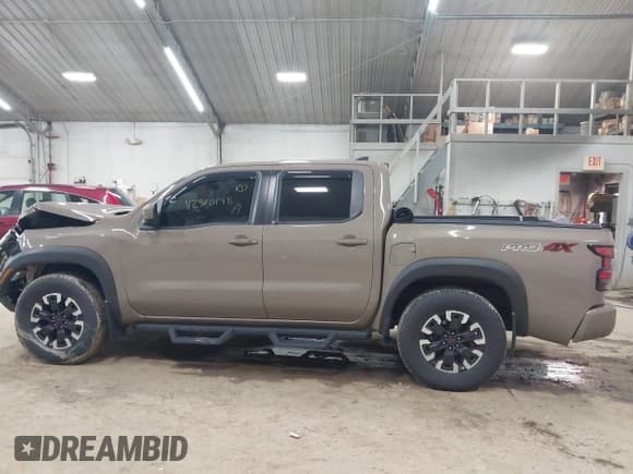 ✅ 2024 Nissan Frontier SV • VIN: 1N6ED1EK8RN613989 • Lot: 42310148. Listed on IAAI with 14,202 mi. Free auction sales archive from the USA and detailed vehicle history report at DreamBid. Image 14.