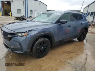 ✅ 2025 Mazda CX-50 S Preferred • VIN: 7MMVABBM5SN338157 • Лот: 90358805. Опубликован ранее на Copart с пробегом 24 551 миль. Бесплатный доступ к архиву аукционных продаж из США и подробный отчёт об истории автомобиля на DreamBid. Изображение 1.