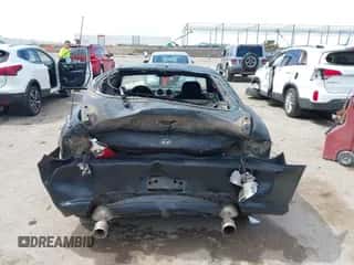 2004 Hyundai Tiburon с VIN KMHHM65D34U125669, выставлен на аукционе IAAI как лот 42320274 с пробегом 176 358 миль миль и . История ставок и продаж доступна на DreamBid. Изображение 6.