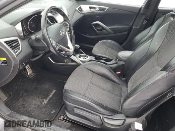 ✅ 2013 Hyundai Veloster w/Black Int • VIN: KMHTC6AD1DU178101 • Lot: 46347805. Wystawiony na Copart z przebiegiem 71 180 mil. Bezpłatny archiwum sprzedaży aukcyjnych z USA i szczegółowy raport historii pojazdu na DreamBid. Zdjęcie 7.