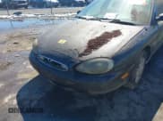 ✅ 1997 Mercury Sable GS • VIN: 1MELM50U7VA656293 • Lot: 41651281. Listed on IAAI with 136,024 mi. Free auction sales archive from the USA and detailed vehicle history report at DreamBid. Image 6.