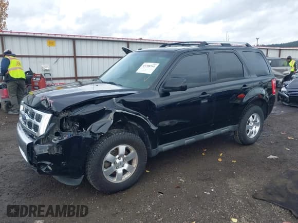 ✅ 2012 Ford Escape Limited • VIN: 1FMCU9EG1CKC68149 • Lot: 43708761. Listed on IAAI with 127,060 mi. Free auction sales archive from the USA and detailed vehicle history report at DreamBid. Image 2.
