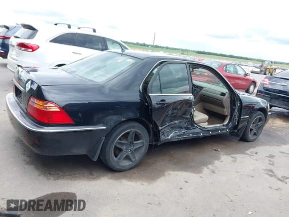 ✅ 2002 Acura RL • VIN: JH4KA965X2C002433 • Lot: 42439321. Wystawiony na IAAI z przebiegiem 175 515 mil. Bezpłatny archiwum sprzedaży aukcyjnych z USA i szczegółowy raport historii pojazdu na DreamBid. Zdjęcie 6.