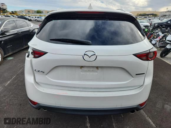 ✅ 2020 Mazda CX-5 Grand Touring • VIN: JM3KFADM2L0825253 • Lot: 86153335. Listed on Copart with 55,428 mi. Free auction sales archive from the USA and detailed vehicle history report at DreamBid. Image 6.
