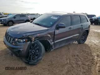 2018 Jeep Grand Cherokee Laredo E with VIN 1C4RJEAG0JC322747, listed as a Copart auction lot 60547435 with 109,935 mi miles and Salvage title. Bid and sale history available at DreamBid. Image 1.