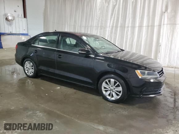 ✅ 2015 Volkswagen Jetta SE • VIN: 3VWD17AJ3FM282409 • Lot: 47864745. Listed on Copart with 86,037 mi. Free auction sales archive from the USA and detailed vehicle history report at DreamBid. Image 4.
