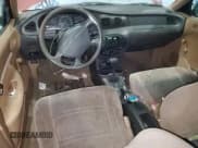 ✅ 1997 Ford Escort LX • VIN: 1FALP13P7VW408884 • Lot: 69968395. Wystawiony na Copart z przebiegiem 237 070 mil. Bezpłatny archiwum sprzedaży aukcyjnych z USA i szczegółowy raport historii pojazdu na DreamBid. Zdjęcie 8.