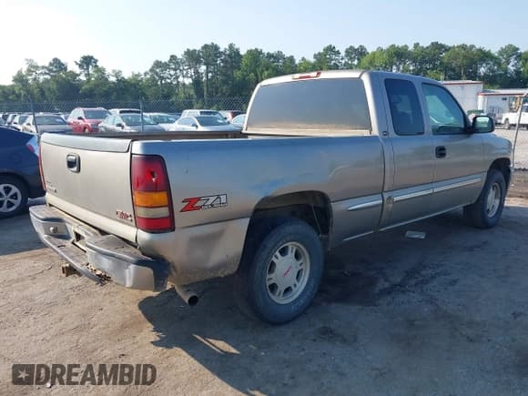 ✅ 2001 GMC Sierra 1500 SLE • VIN: 1GTEK19T41E295255 • Лот: 42656738. Опубликован ранее на IAAI с пробегом 357 789 миль. Бесплатный доступ к архиву аукционных продаж из США и подробный отчёт об истории автомобиля на DreamBid. Изображение 4.