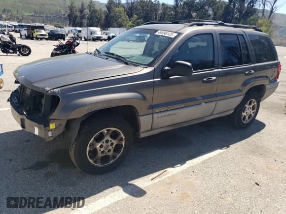 ✅ 1999 Jeep Grand Cherokee Laredo • VIN: 1J4G258S6XC606420 • Лот: 49896105. Опубликован ранее на Copart с пробегом 170 904 миль. Бесплатный доступ к архиву аукционных продаж из США и подробный отчёт об истории автомобиля на DreamBid. Изображение 1.