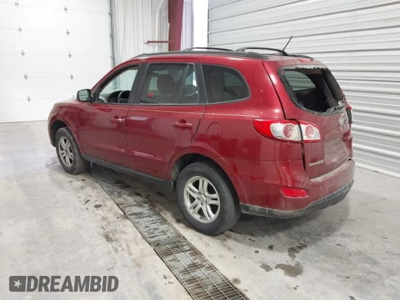 ✅ 2012 Hyundai Santa Fe GLS • VIN: 5XYZGDAG4CG135583 • Lot: 41305409. Listed on IAAI with 155,944 mi. Free auction sales archive from the USA and detailed vehicle history report at DreamBid. Image 3.