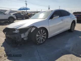 ✅ 2021 Lexus ES 300h • VIN: 58ADA1C10MU010071 • Lot: 67445155. Wystawiony na Copart z przebiegiem 84 306 mil. Bezpłatny archiwum sprzedaży aukcyjnych z USA i szczegółowy raport historii pojazdu na DreamBid. Zdjęcie 1.