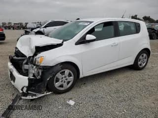 ✅ 2014 Chevrolet Sonic LS • VIN: 1G1JA6SGXE4197654 • Lot: 92868875. Listed on Copart with 115,903 mi. Free auction sales archive from the USA and detailed vehicle history report at DreamBid. Image 1.