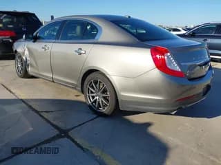 ✅ 2015 Lincoln MKS • VIN: 1LNHL9DK1FG603335 • Lot: 43623350. Wystawiony na IAAI z przebiegiem 99 810 mil. Bezpłatny archiwum sprzedaży aukcyjnych z USA i szczegółowy raport historii pojazdu na DreamBid. Zdjęcie 3.