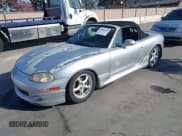 ✅ 2001 Mazda MX-5 Miata • VIN: JM1NB353110208734 • Lot: 43904436. Listed on IAAI with 99,908 mi. Free auction sales archive from the USA and detailed vehicle history report at DreamBid. Image 2.