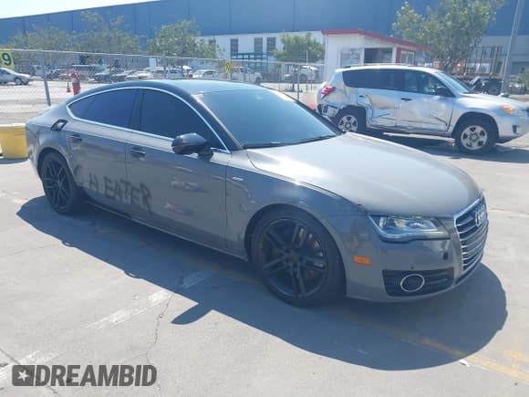 ✅ 2012 Audi A7 Prestige • VIN: WAUSGAFC6CN006028 • Lot: 43185386. Wystawiony na IAAI z przebiegiem 212 583 mil. Bezpłatny archiwum sprzedaży aukcyjnych z USA i szczegółowy raport historii pojazdu na DreamBid. Zdjęcie 1.